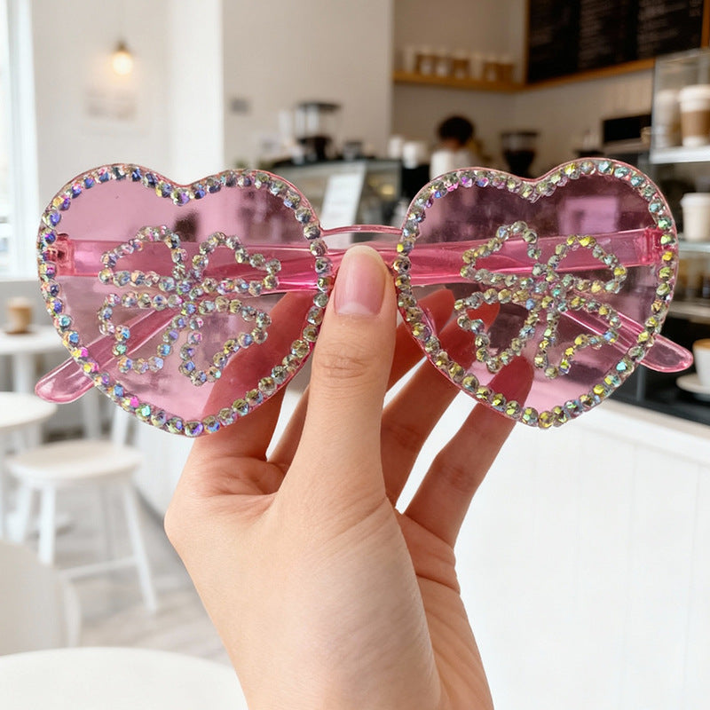 Trendy women's rhinestone heart sunglasses, perfect fashion accessory with UV protection.