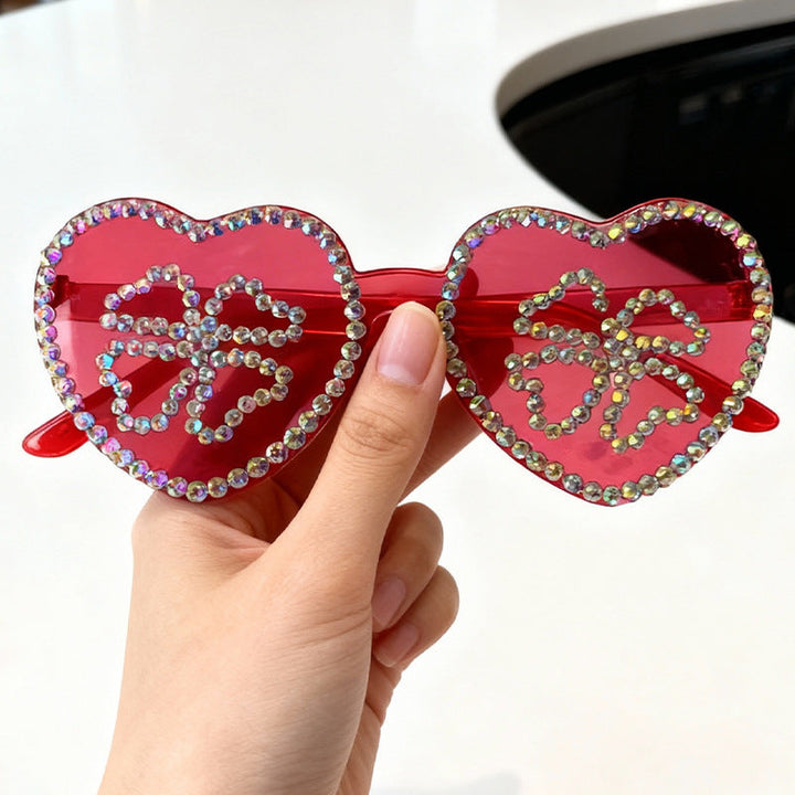 Chic women's rhinestone heart sunglasses, a sparkling fashion statement eyewear.