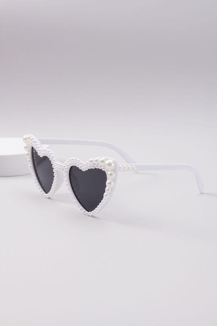 Versatile heart-shaped women's sunglasses, glamorous eyewear for beach, party, or daily chic, UV protection.