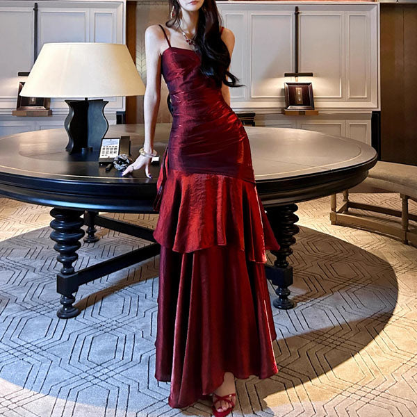 Sophisticated women's ruffled maxi dress, showcasing flowy fabric. Ideal for formal, gala or wedding guest.