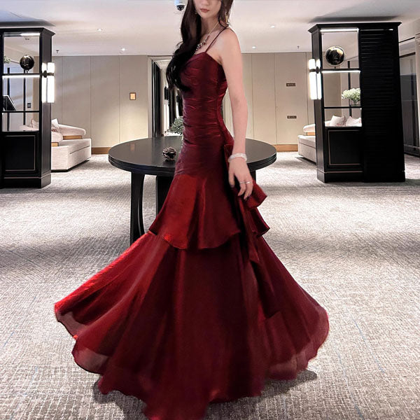 Graceful women's long ruffled maxi dress, designed for special occasions, red carpet & formal events.