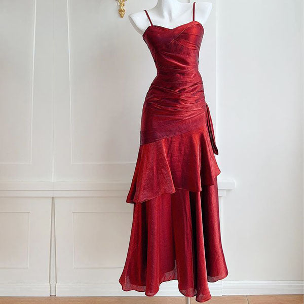 Stylish women's glamorous ruffled maxi dress, perfect for an elegant evening, wedding guest or formal party.