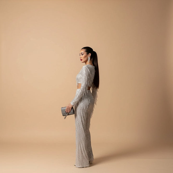 Chic women's sequin co-ord set with a dazzling crop top & wide-leg pants. Elevate your evening style.