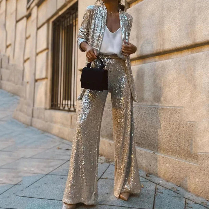 New women's glamorous sequin two-piece set, a chic party outfit with dazzling top and high-waisted pants.