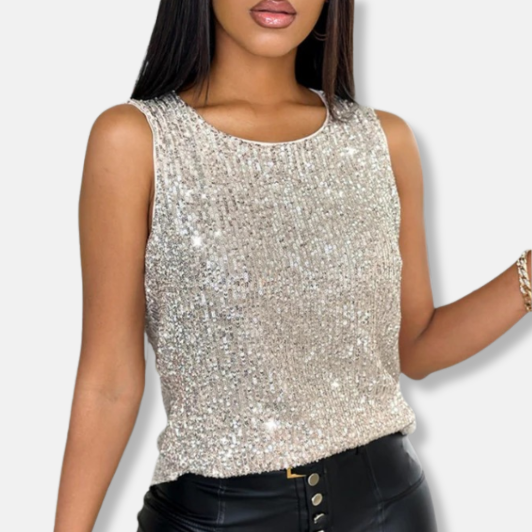 Stylish women's sleeveless sequin top. Silver party wear for a chic, glamorous evening or club look.