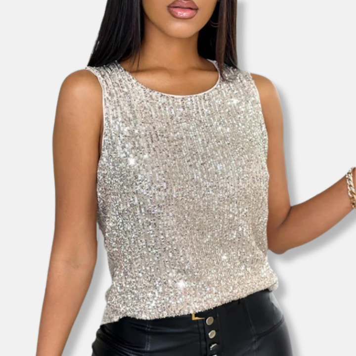 Stylish women's sleeveless sequin top. Silver party wear for a chic, glamorous evening or club look.