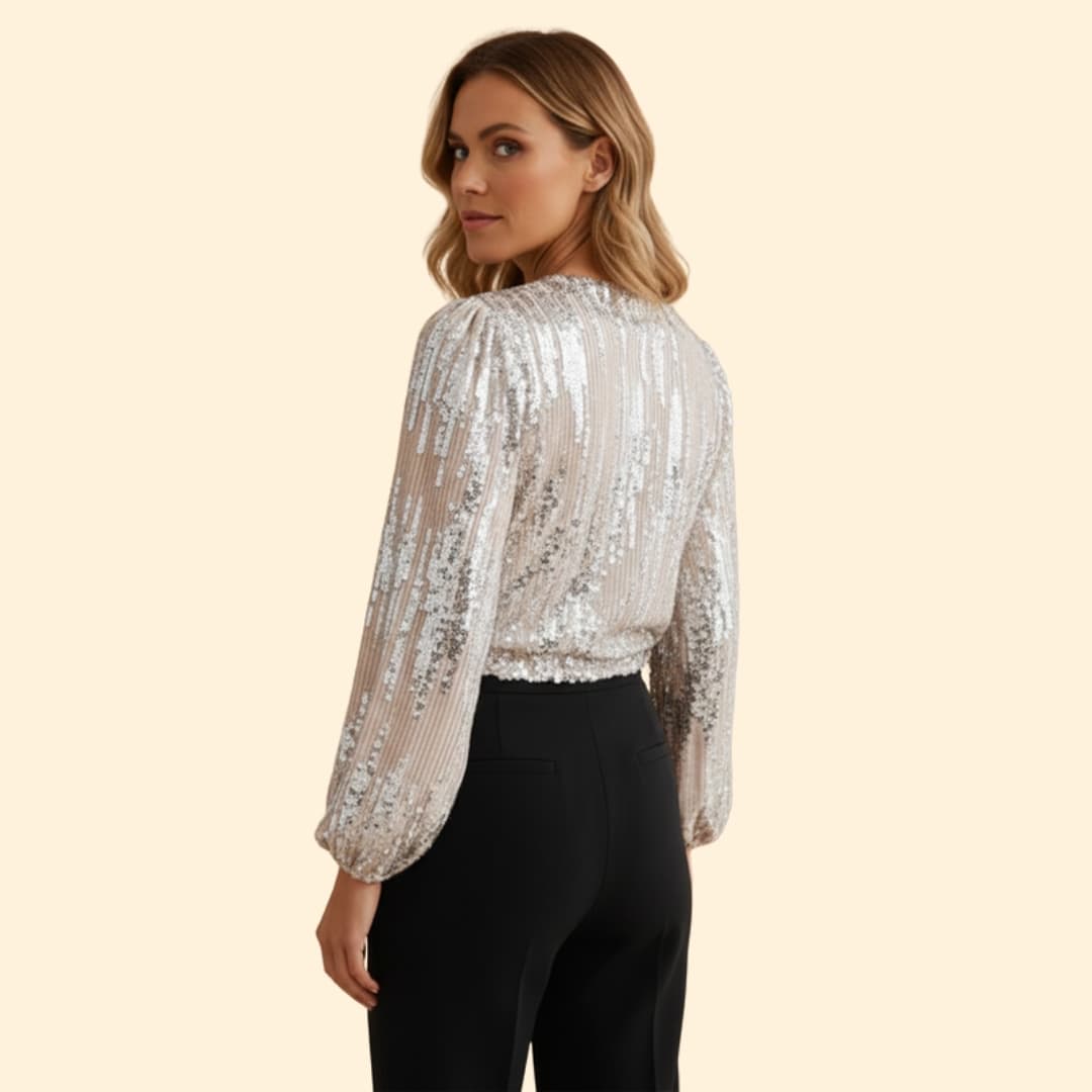 Women's sparkling gold sequin wrap blouse, a glamorous V-neck, long sleeve party top for special occasions.