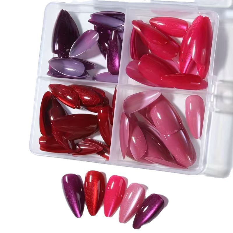 Long stiletto glossy nail tips for women, offering an elegant look for easy DIY press-on nail art supplies.