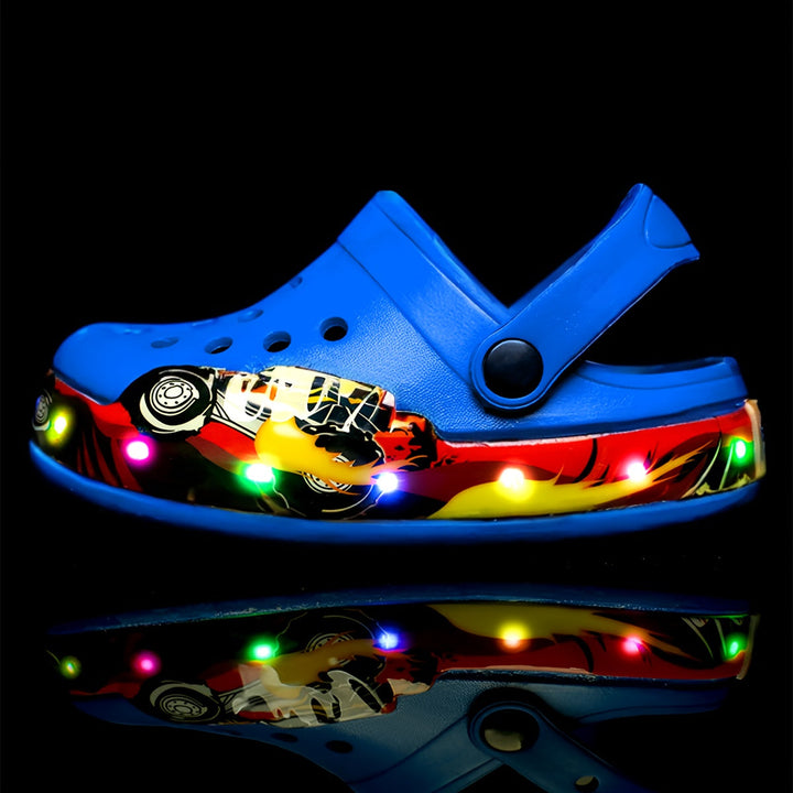 Front view of children's glow clogs, slip-on design with ventilation ports. Anti-slip footwear for active kids.