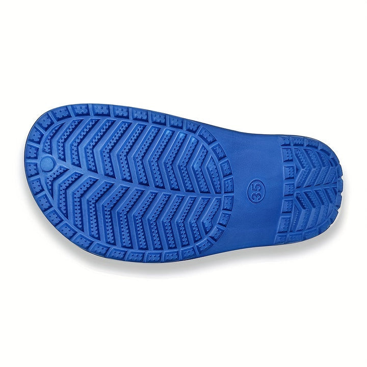 Anti-slip kids clogs with a fun glow-in-the-dark finish. Durable & breathable children's footwear for all play.