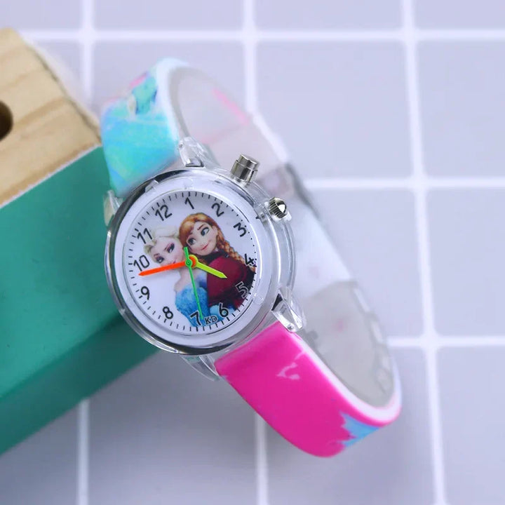 Young girl wearing a Frozen glow-in-the-dark kids watch, stylish and perfect for girls' daily wear.