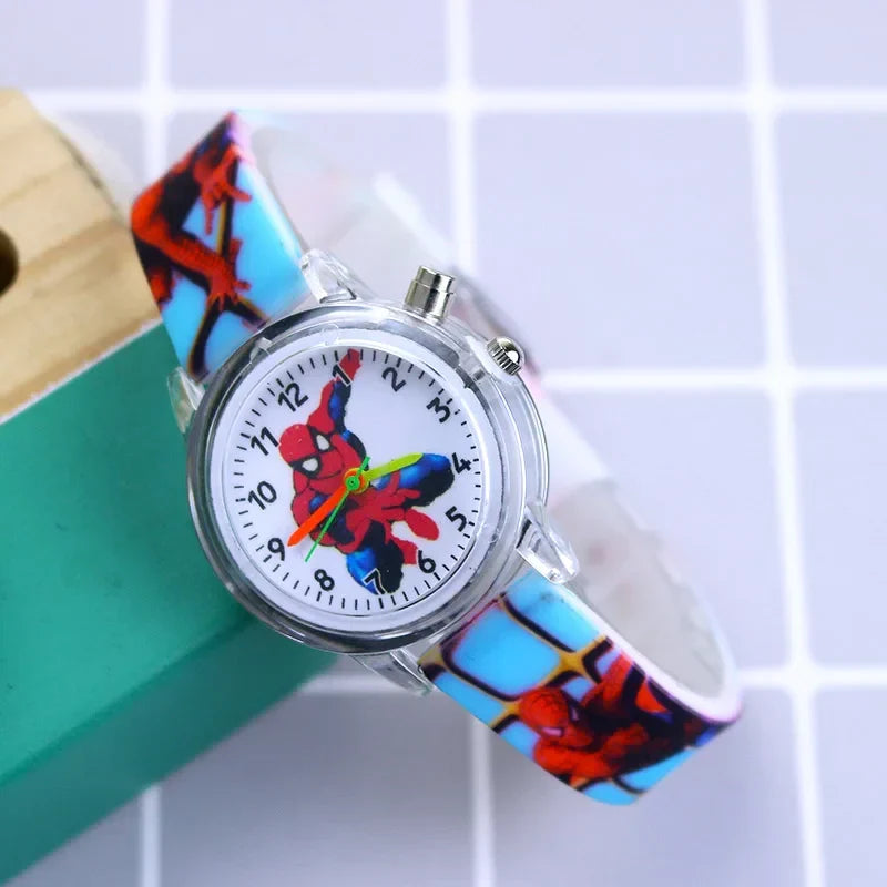 Young boy wearing a Spider-Man glow-in-the-dark kids watch, showing comfortable fit on wrist.