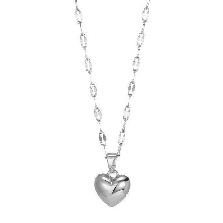 Perfect gift: Women's gold heart pendant necklace with adjustable chain. Elegant love jewelry.