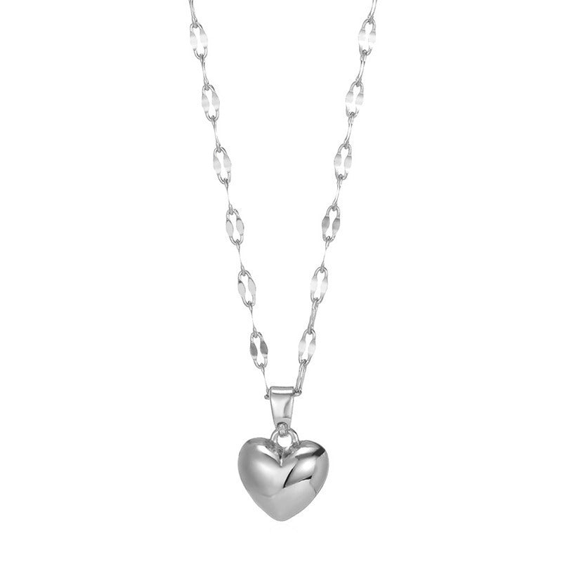 Everyday elegant women's gold heart pendant necklace. Adjustable, perfect for any occasion.