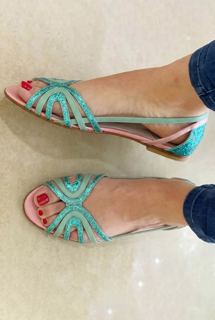 Elegant golden women's slip-on sandals, a chic choice for summer style, comfort & effortless wear.
