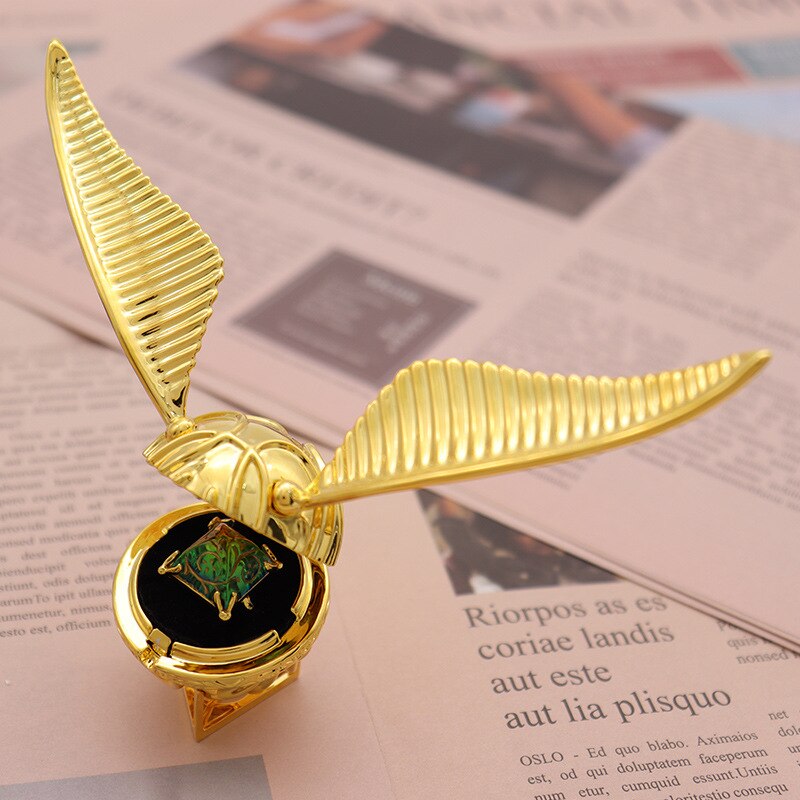 Unisex fantasy golden winged orb jewelry box, a unique movable keepsake for rings.