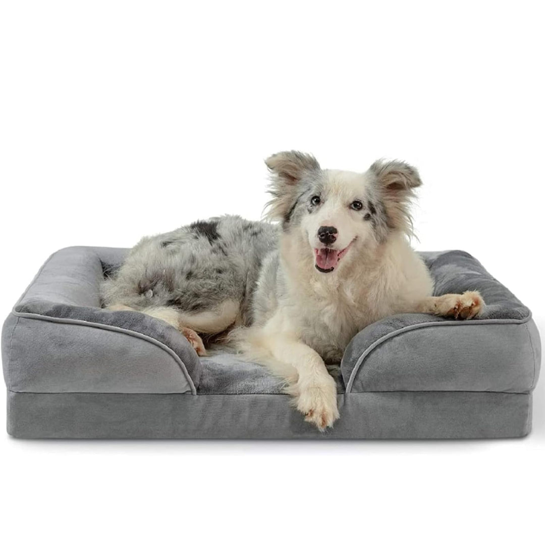 Gray orthopedic memory foam dog bed with washable cover, providing joint and muscle relief for ultimate pet comfort.