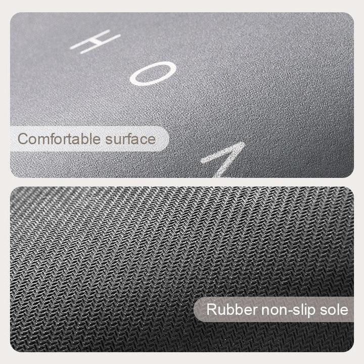 Non-slip blue oval bath mat, ultimate absorbency for a dry and safe bathroom environment.