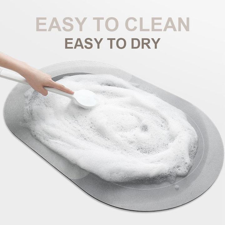Highly absorbent grey bath mat, quick-dry technology keeps bathroom floors safe & slip-free.