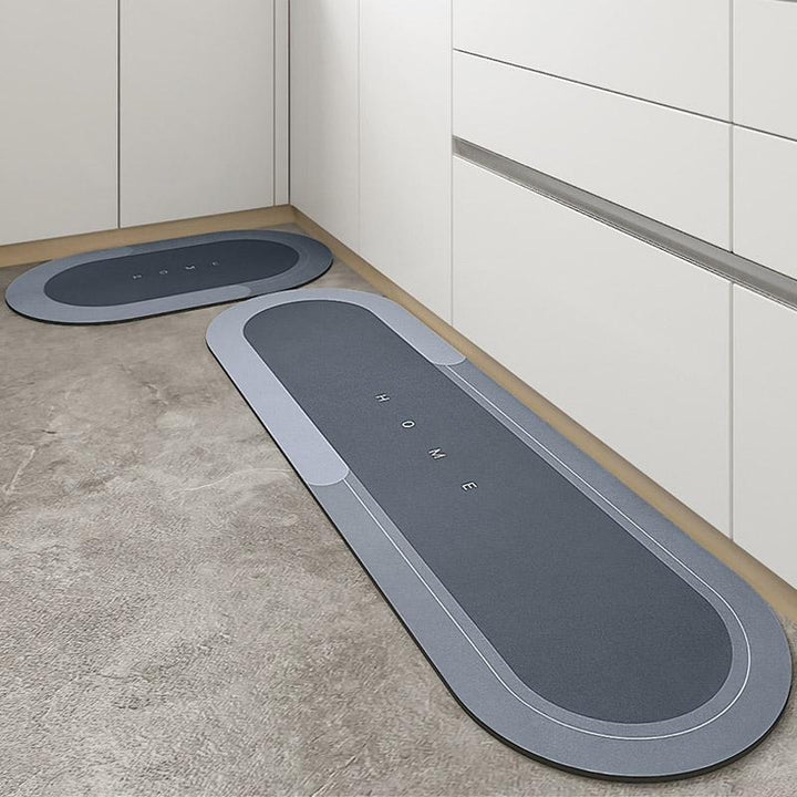 Rectangle absorbent blue bath mat, ensures dry, slip-free bathroom floors with its quick-dry feature.