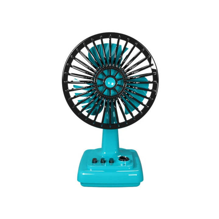 Green retro portable desk fan, small & quiet, for personal cooling in a home office or living space.