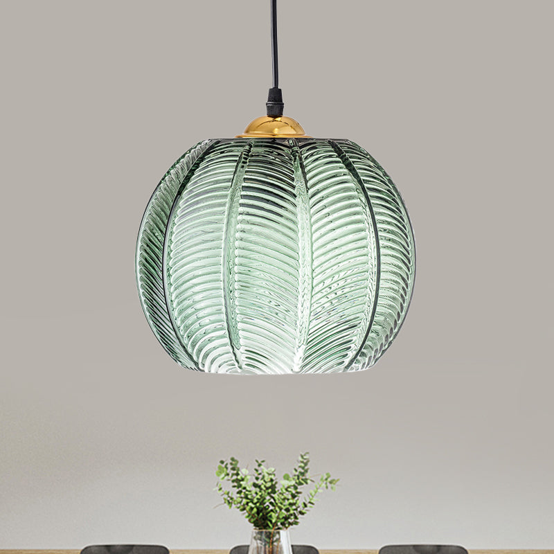 Green ribbed glass dome pendant light, ideal for vintage home decor, kitchen island or ambient ceiling lighting.