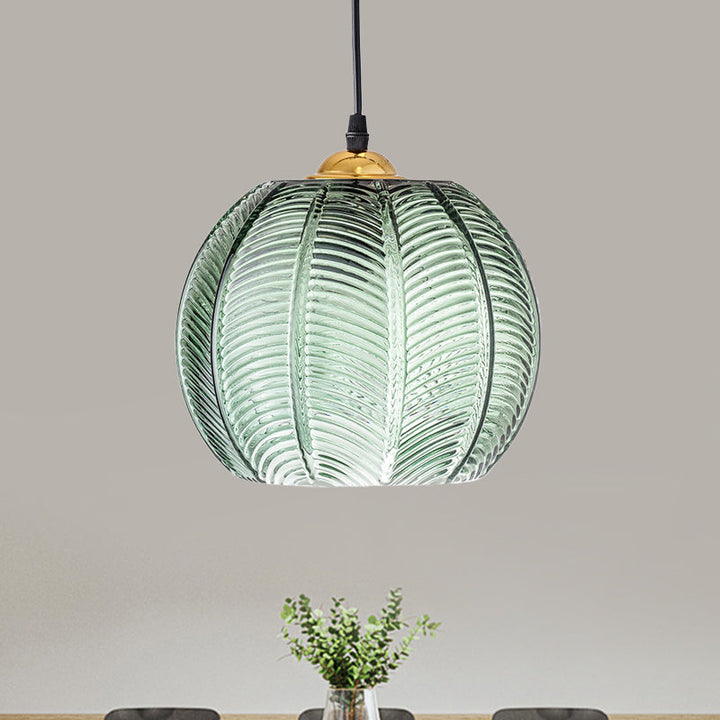 Green ribbed glass dome pendant light, ideal for vintage home decor, kitchen island or ambient ceiling lighting.
