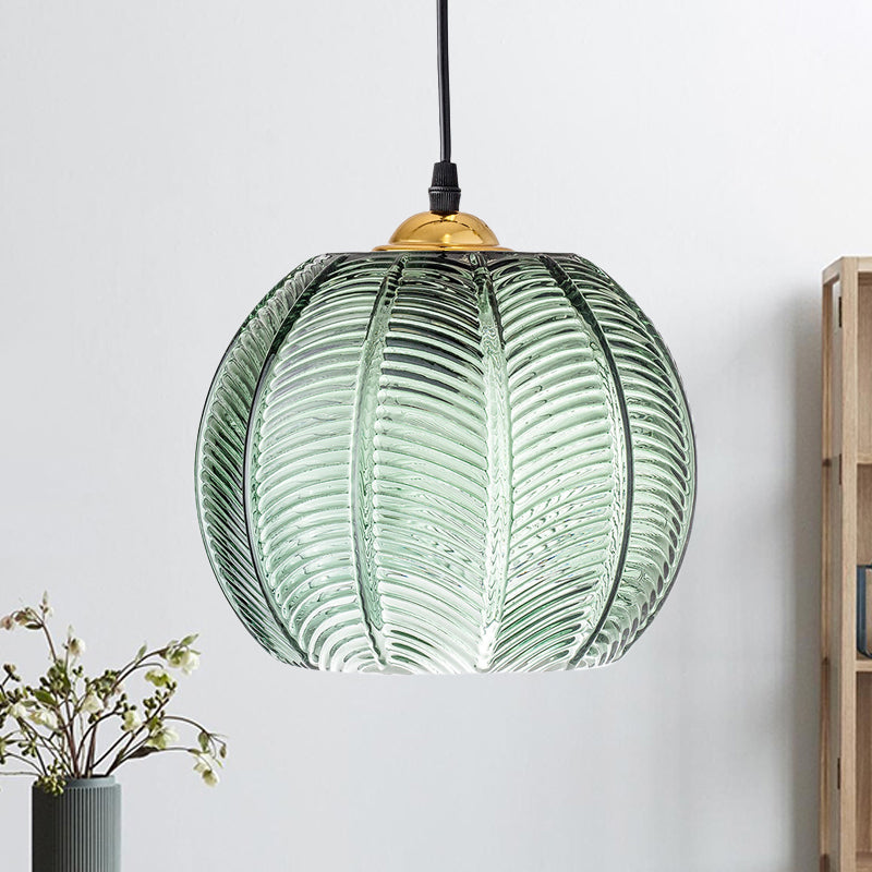 Vintage style ribbed glass pendant lamp with a green dome shade, perfect as a hanging ceiling fixture for home decor.