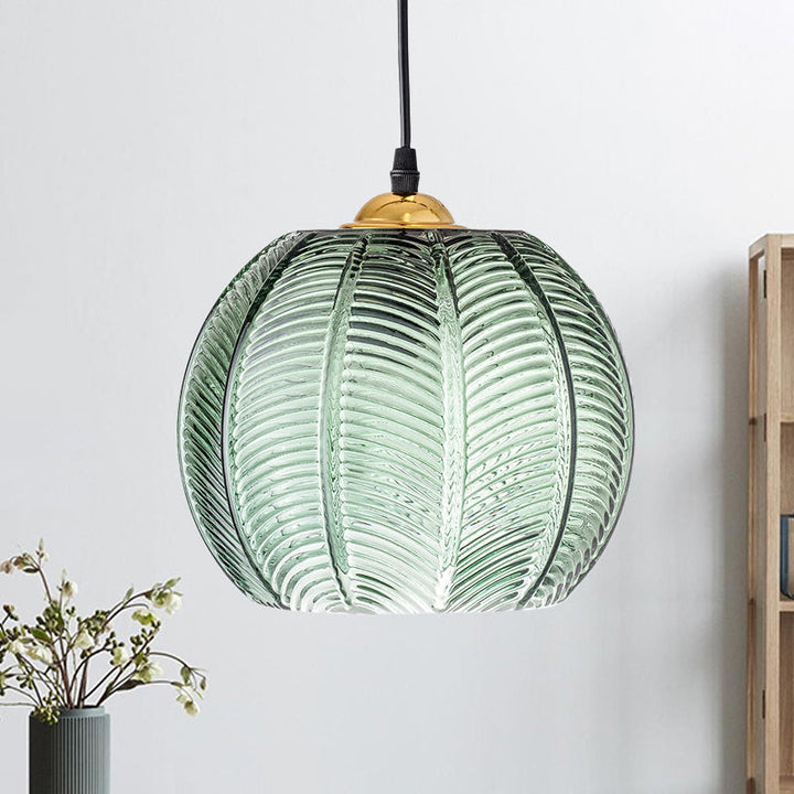 Vintage style ribbed glass pendant lamp with a green dome shade, perfect as a hanging ceiling fixture for home decor.