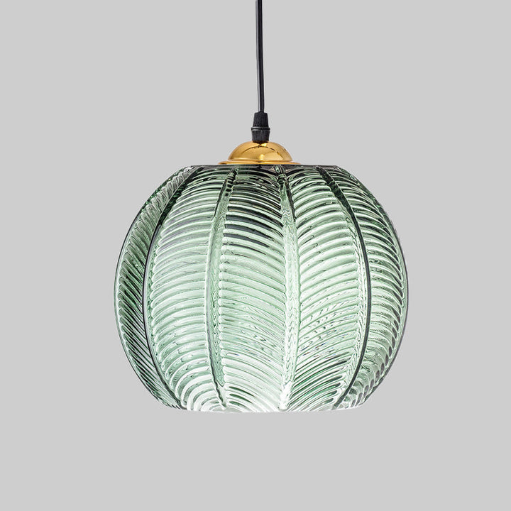 Ribbed glass dome pendant light, a vintage green ceiling fixture providing ambient lighting for home decor.