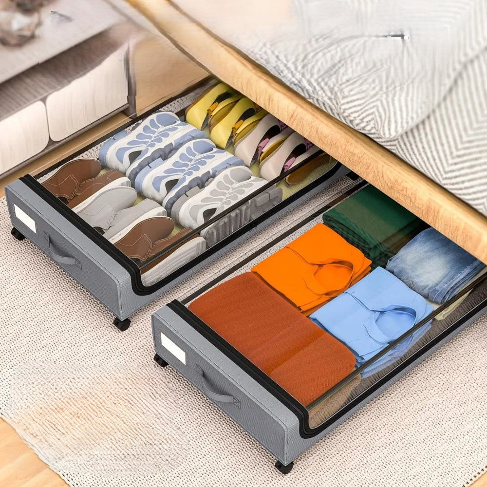 Grey wheeled underbed storage box for space-saving home organization. Perfect for decluttering bedrooms & closets.