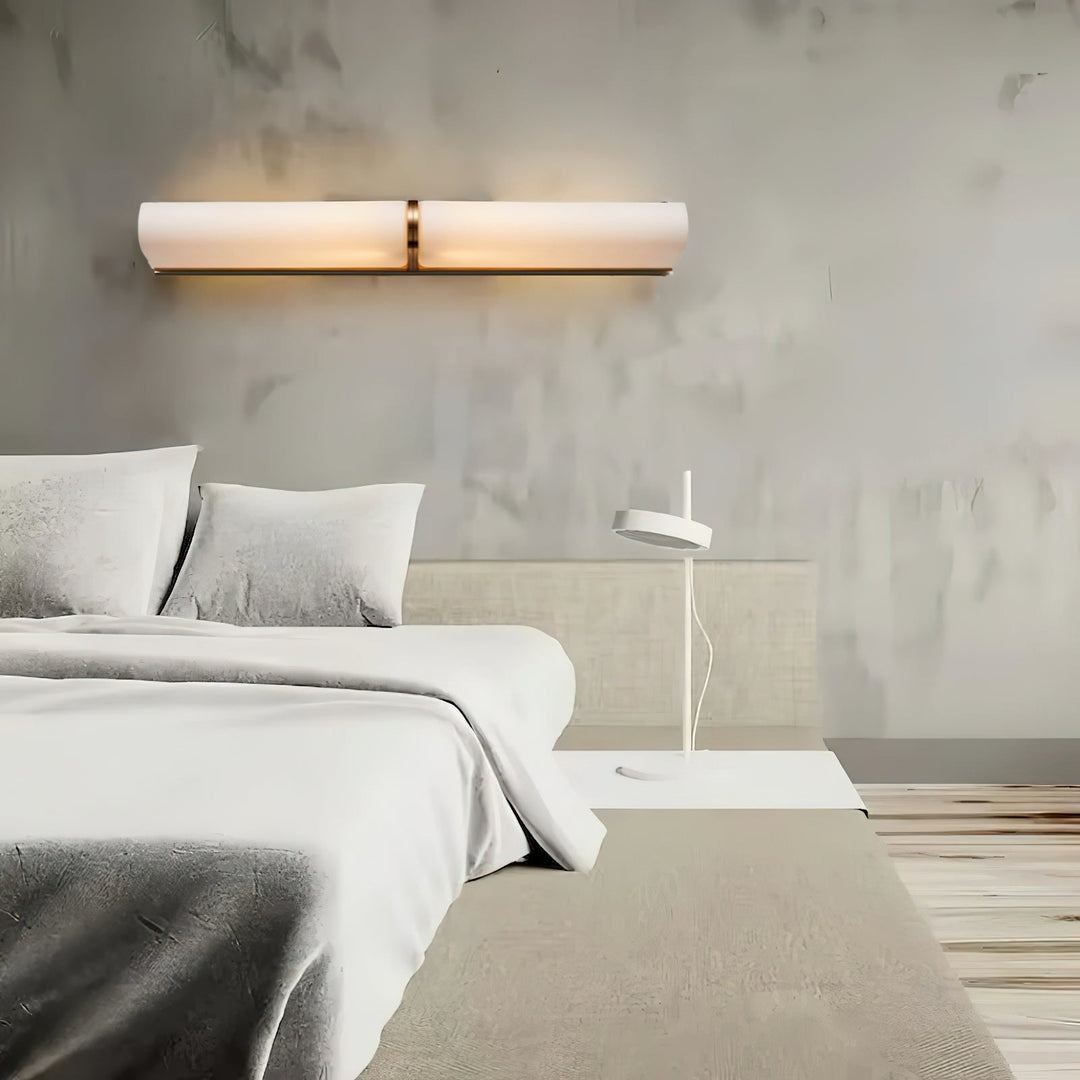Elegant Greymi Hand-blown glass LED wall light. Modern interior lighting for upscale homes.