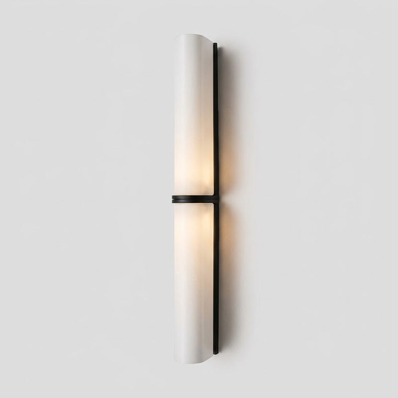 Greymi Hand-blown glass LED wall lamp. Sleek modern design for contemporary home decor.