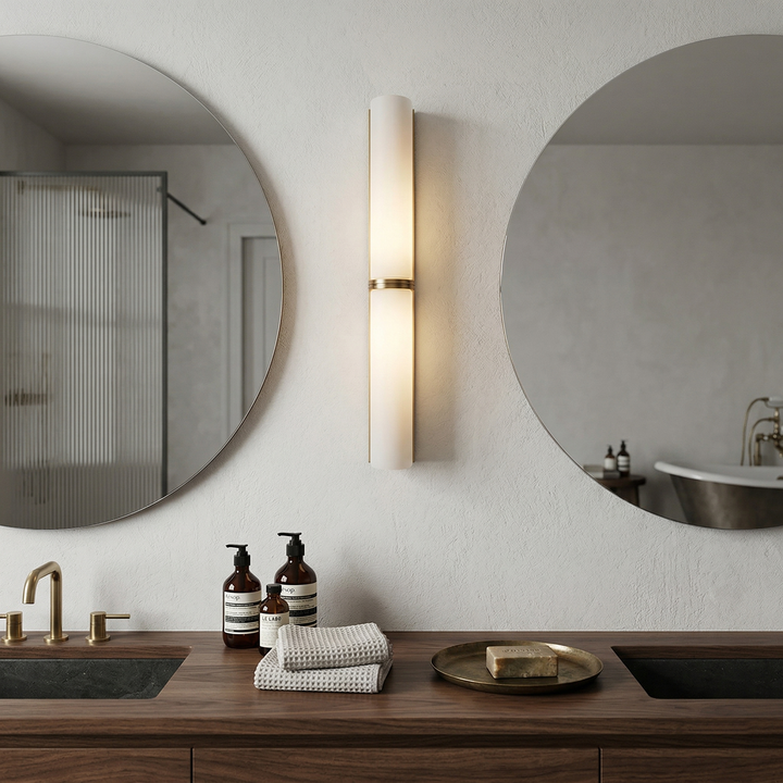 Greymi Hand-blown glass LED wall light for modern home decor. Sleek contemporary design.