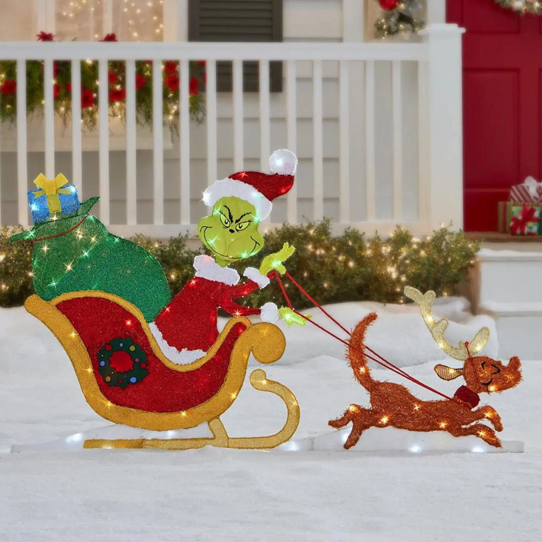 Iconic Grinch LED outdoor light, perfect for a fun and bright holiday garden.