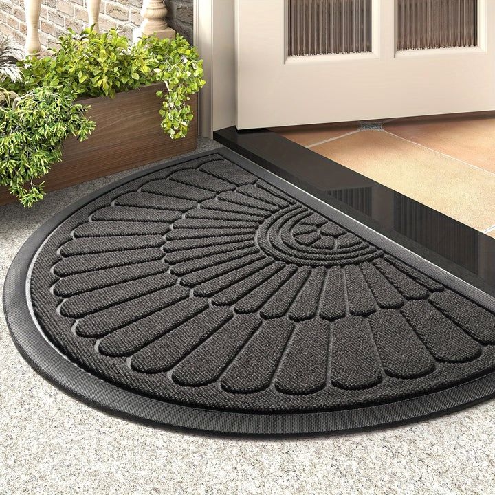 Sustainable half-round rubber door mat, a durable dirt trap for any entryway.