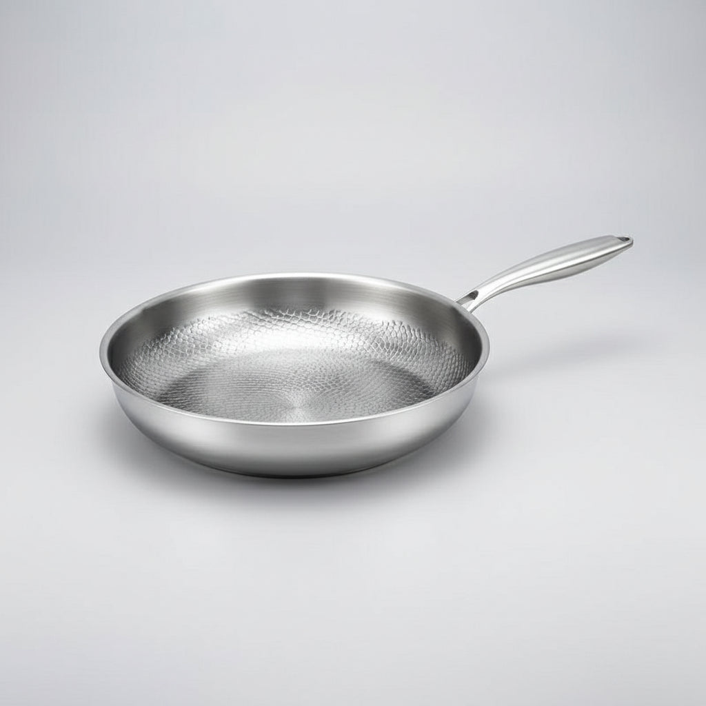 Premium hammered titanium skillet, delivering superior cooking results on induction hobs.