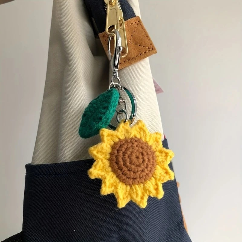 Vibrant sunflower crochet keychain, a charming handmade floral accessory for keys, bags, or as a gift.