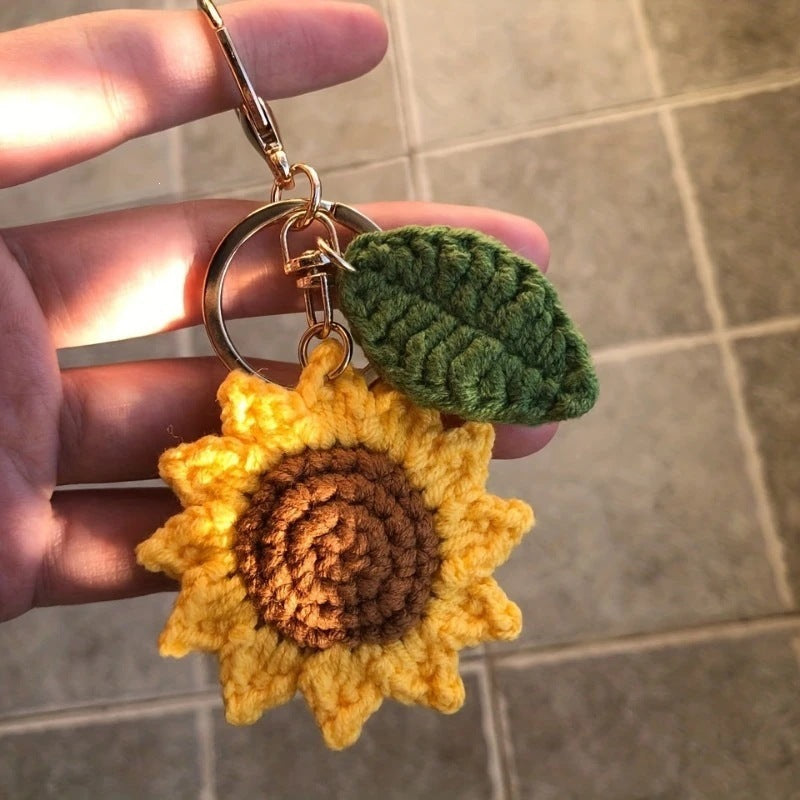 Artisan handmade crochet keychain, featuring a lovely floral sunflower design. Ideal bag or key accessory.