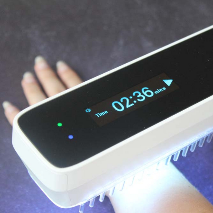 Easy-to-use handheld UVB lamp for effective psoriasis, vitiligo, and eczema skin treatment.