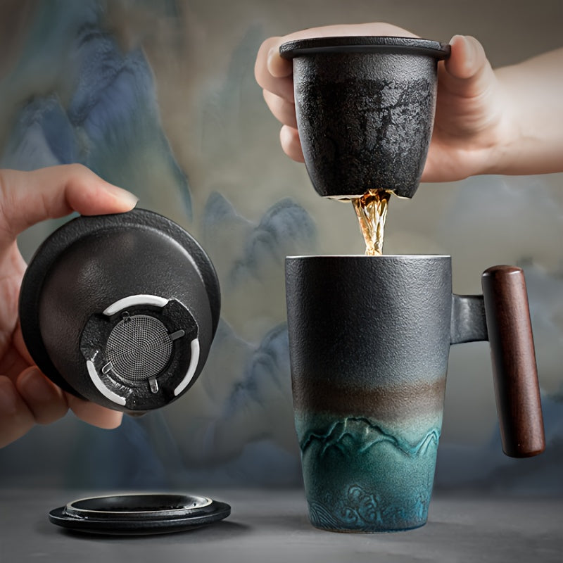 Handmade ceramic tea mug with strainer for loose leaf tea. Authentic design drinkware.
