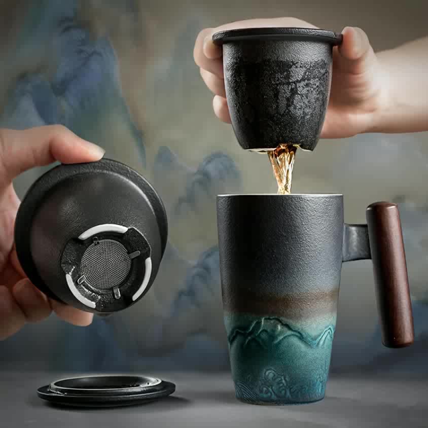 Decorative & functional handmade ceramic tea mug featuring a convenient loose leaf tea strainer.