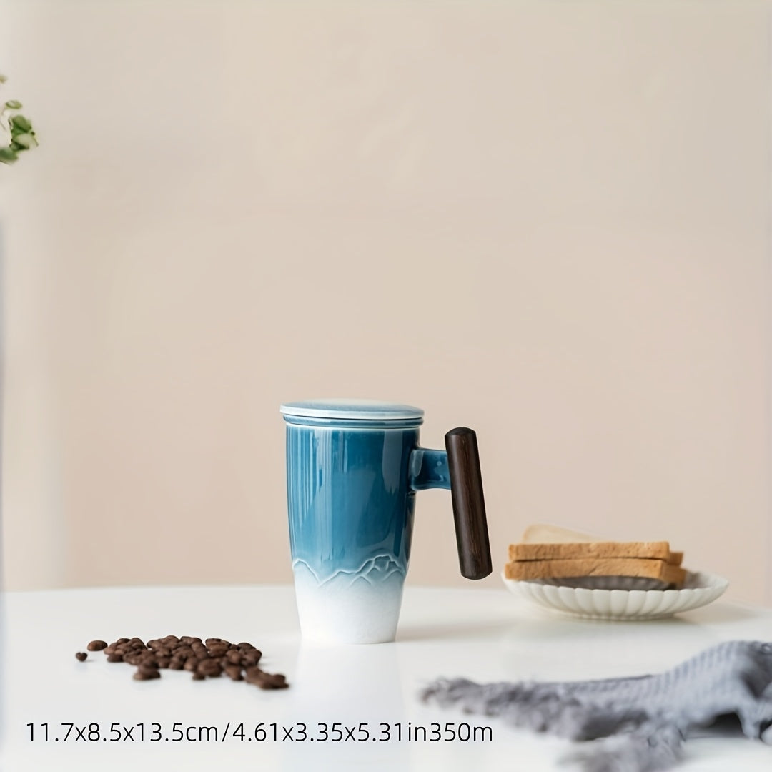 Practical ceramic tea mug with built-in strainer for easy loose leaf tea brewing. Kitchenware.