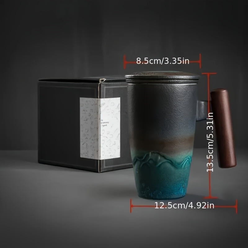 Unique handmade ceramic tea mug with strainer, a perfect gift for any tea or coffee lover.