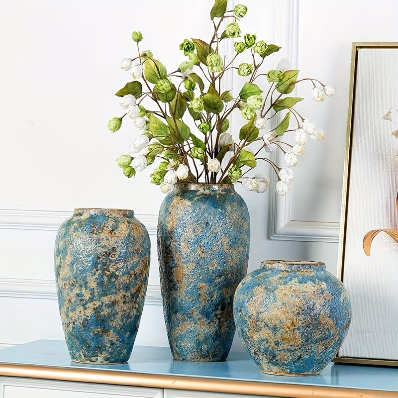 Handmade vintage blue ceramic vase. Unique earthenware pottery for rustic home decor and interior accent.