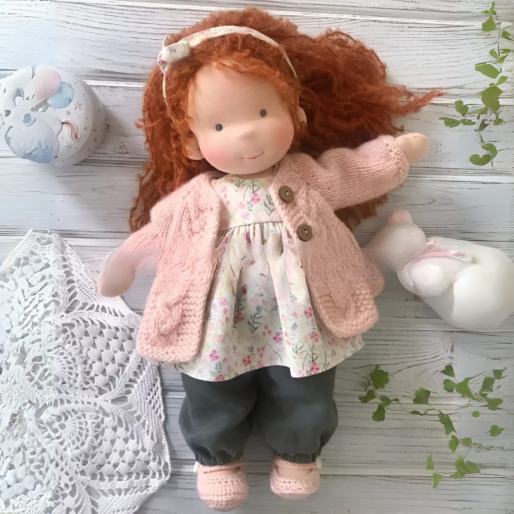 Kids' handmade Waldorf cuddly doll, natural materials, promoting imaginative play.