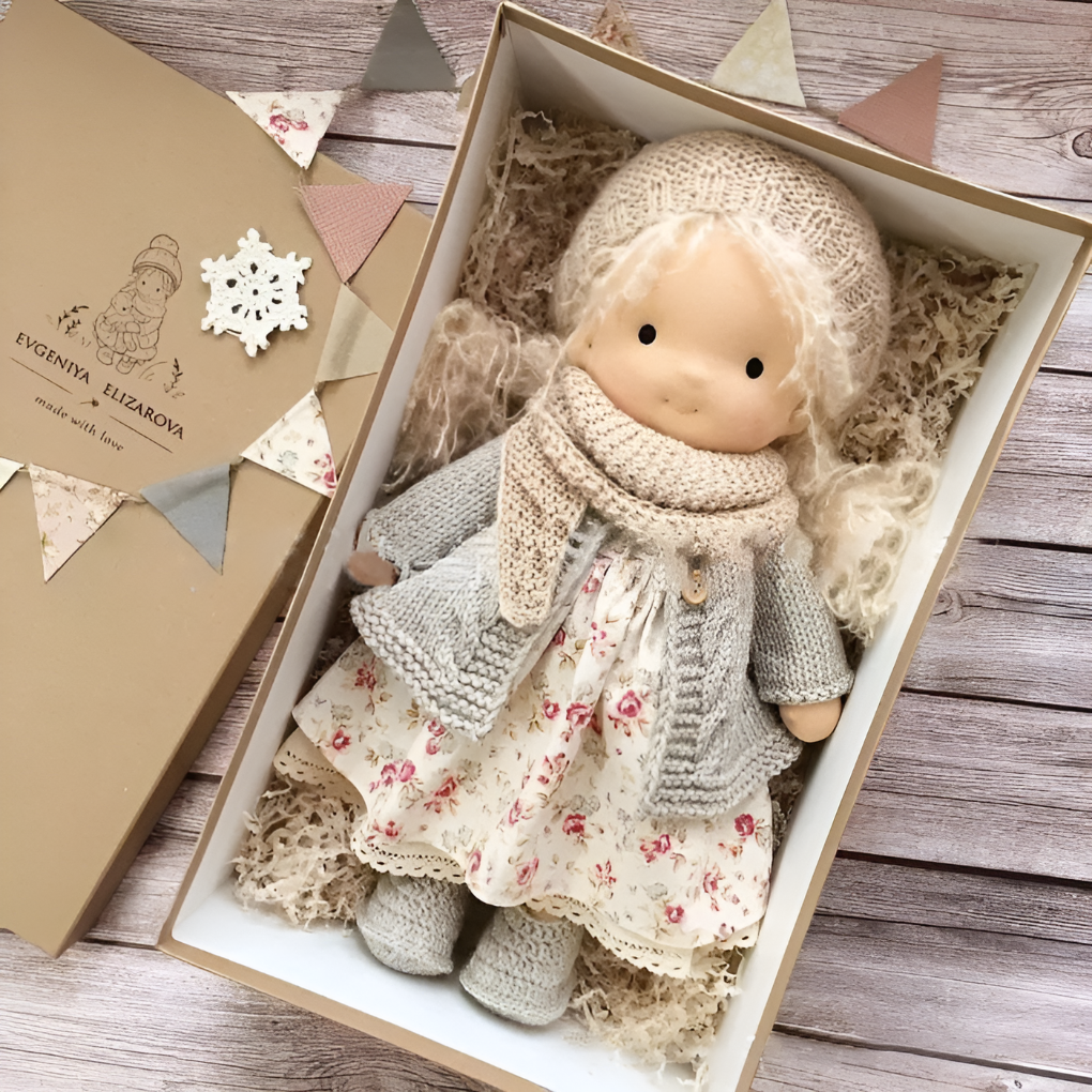 Soft cuddly Waldorf doll, handmade with natural fibers, for imaginative play in kids.