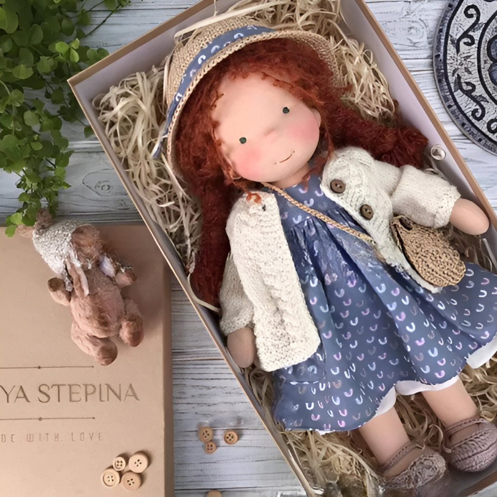 Toddler's handmade Waldorf doll, natural materials, a soft cuddly toy encouraging imaginative play.