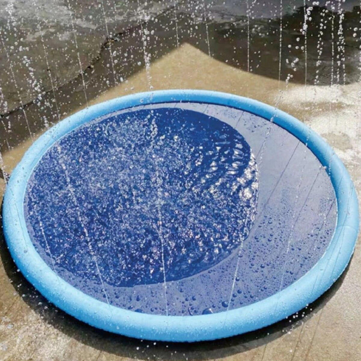 Dog splashing in a blue durable summer pet fountain pool toy, ideal for outdoor water fun.