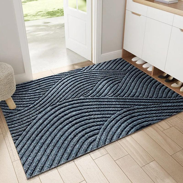 Indoor door mat with non-slip backing, heavy-duty for entryways, improving home decor.